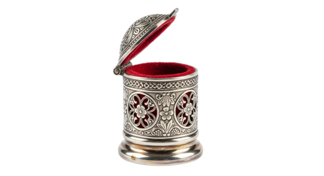 Closeup of a silver filigree box with red velvet lining, isolated on transparent background
