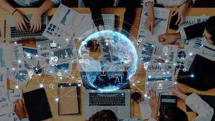 A diverse team engages in data analysis and collaboration, surrounded by digital technology symbols and charts, showcasing modern workplace dynamics and innovation. Raster - Powered by Adobe