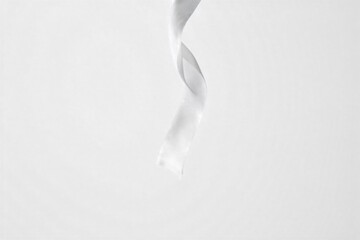 Abstract texture study on white flowing silk ribbon casting soft shadows A single, flowing silk ribbon in a soft pastel color (e.g., blush pink or sky blue) draped organically on a seamless pure white