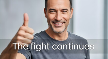 A smiling middle-aged man giving a thumbs-up gesture with a positive expression in a modern indoor setting