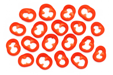 Red bell pepper slices forming a beautiful pattern, ideal for cooking, healthy recipes, and food design