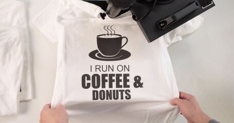 The Young Man Customizes T-shirts With His Heat Transfer Press