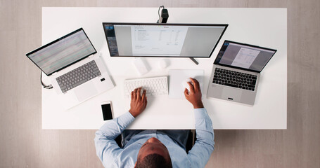 Skilled Accountant Analyzing Tax Data On Computer Screen