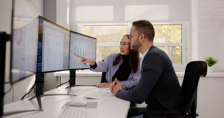 Financial Advisor And Accountant Analyzing Data