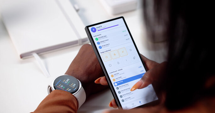 African American Woman Monitoring Her Fitness Stats