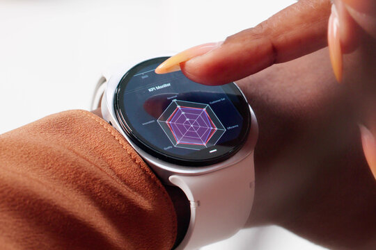 Tech-savvy Business Woman Reviewing Marketing Data