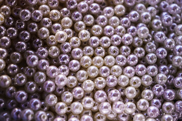 Beautiful white beads. Pearls. Bead texture and background.