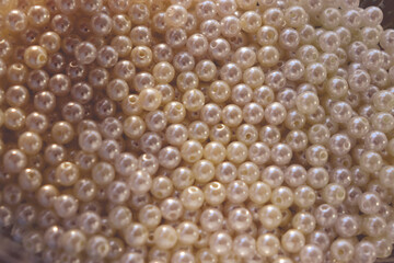 Beautiful white beads. Pearls. Bead texture and background.