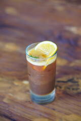 Fresh lemon soda drink with ice cubes and mint leaves, showing refreshing and sparkling beverage concept.