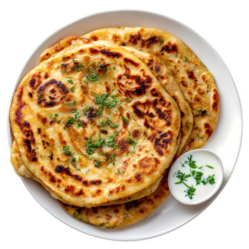 Delicious aloo paratha served with yogurt and green chilies, isolated on transparent background