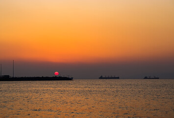 Vladivostok in the evening. Embankment at sunset.