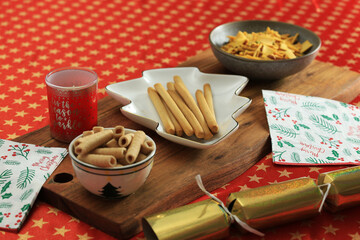 Christmas themed dishes on Christmas Table cloth