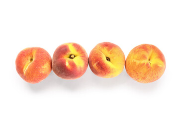 Sweet peaches on white background