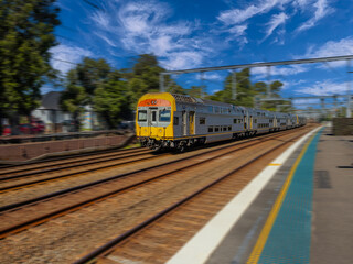 Fototapeta premium Passenger Train going through Summer Hill train station a suburban Sydney train Station NSW Australia