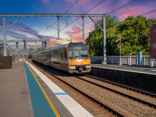 Passenger Train going through Summer Hill train station a suburban Sydney train Station NSW Australia