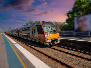Obraz premium Passenger Train going through Summer Hill train station a suburban Sydney train Station NSW Australia