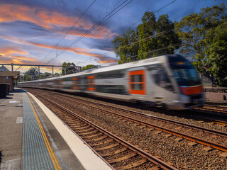 Naklejka premium Passenger Train going through Summer Hill train station a suburban Sydney train Station NSW Australia