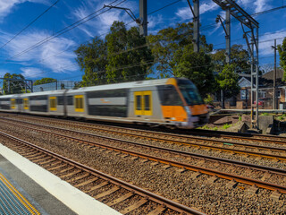 Passenger Train going through Summer Hill train station a suburban Sydney train Station NSW Australia