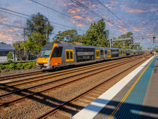 Naklejka premium Passenger Train going through Summer Hill train station a suburban Sydney train Station NSW Australia