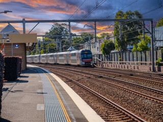 Passenger Train going through Summer Hill train station a suburban Sydney train Station NSW Australia