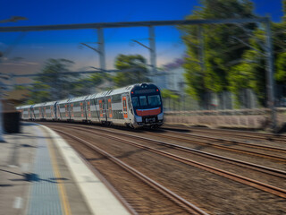 Fototapeta premium Passenger Train going through Summer Hill train station a suburban Sydney train Station NSW Australia