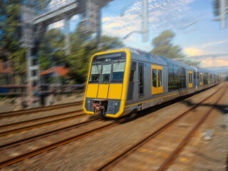 Obraz premium Passenger Train going through Summer Hill train station a suburban Sydney train Station NSW Australia