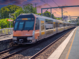 Passenger Train going through Summer Hill train station a suburban Sydney train Station NSW Australia