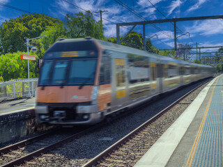 Passenger Train going through Summer Hill train station a suburban Sydney train Station NSW Australia