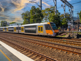 Passenger Train going through Summer Hill train station a suburban Sydney train Station NSW Australia