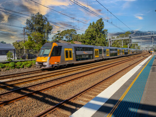 Fototapeta premium Passenger Train going through Summer Hill train station a suburban Sydney train Station NSW Australia