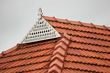 clay roof tiles pattern design on a building