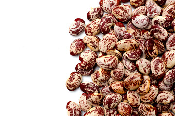 Speckled lima beans with red white patterns.