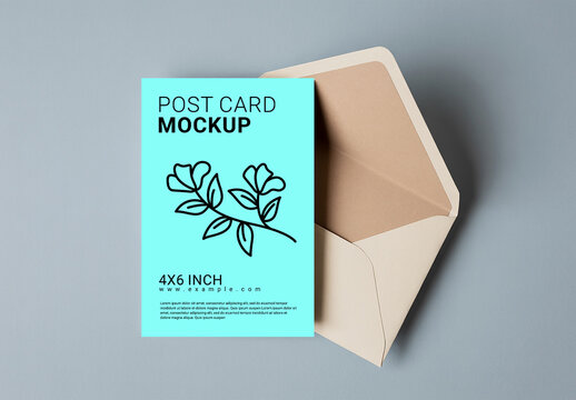Postcard Mockup on Soft Blue Desk with Open Kraft Envelope