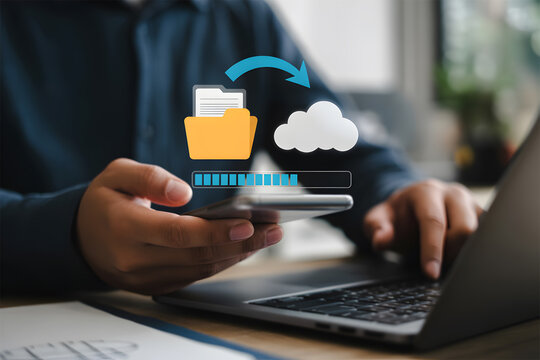 Person transferring files from phone to cloud server for data backup and storage