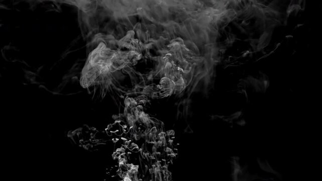 smoke and fog abstract background Loopable abstract swirling smoke and a soft, radiant light rising from below against a black background  useful as an overlay layer, dynamic and ethereal fog effect