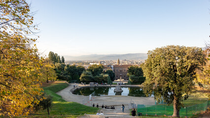 Boboli Gardens, The Fountain of Neptune, with the Pitti Palace and the city of Florence in the distance, Italy