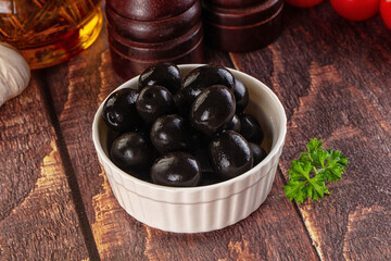 Mediterranean marinated Black olives in the bowl
