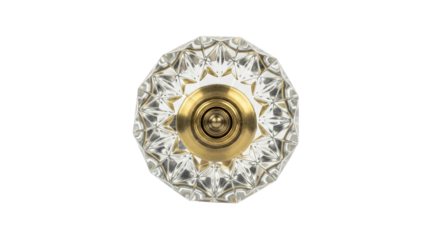 Faceted glass door knob with brass base and concentric detailing—sparkling, vintage-style design ideal for elegant interiors and ornamental hardware applications