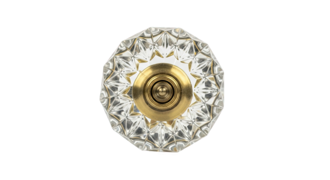 Faceted glass door knob with brass base and concentric detailing—sparkling, vintage-style design ideal for elegant interiors and ornamental hardware applications
