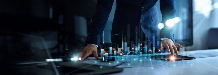 Businessman analyzing and calculating graph complex data for long term investment growth goals and company finance balance, development to achieve goals, Business strategy and planning.