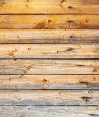 Obraz premium A wooden board with many holes in it