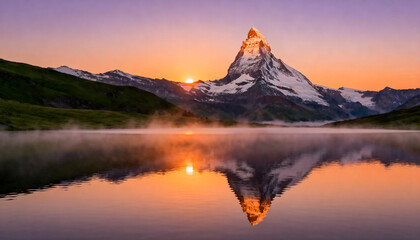 matterhorn mountain reflected in calm lake at sunrise