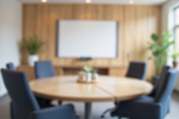 Blurred background of modern conference room with circular table, soft lighting and whiteboard, designed for collaborative meetings and professional discussions in a corporate environment.
