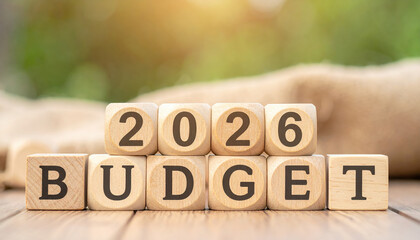 Wooden blocks spelling out 2026 Budget on blurred background, symbolizing financial planning and future economic strategies. arrangement conveys sense of organization and foresight