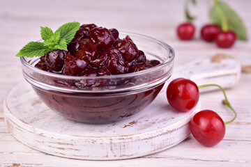 Cherry jam in a glass bowl. Close-up. Homemade cherry jam.
