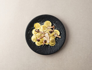 Ravioli pasta with mushrooms on a plate