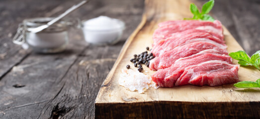 fresh raw meat on cutting board