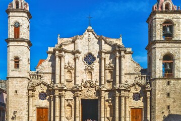 Historic havana cathedral with twin towers under blue sky