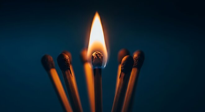 Illuminated Matchstick - A Beacon of Light in the Darkness.