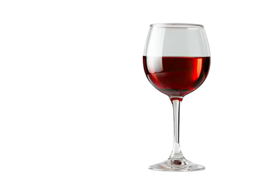 A stemmed glass filled with red liquid against a black background, slightly angled